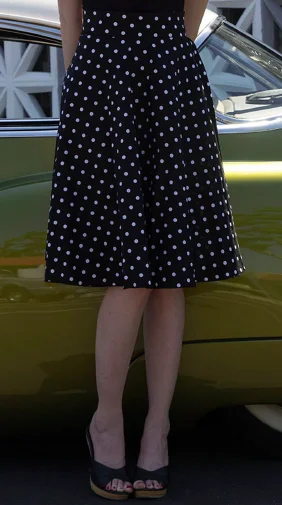 Retro Gal Polka Dot Swing Skirt in Black button skirt front